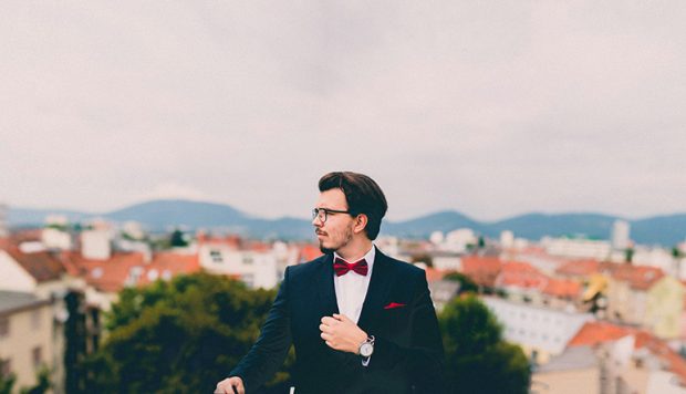 Groom wearing bow tie wedding dress shirt