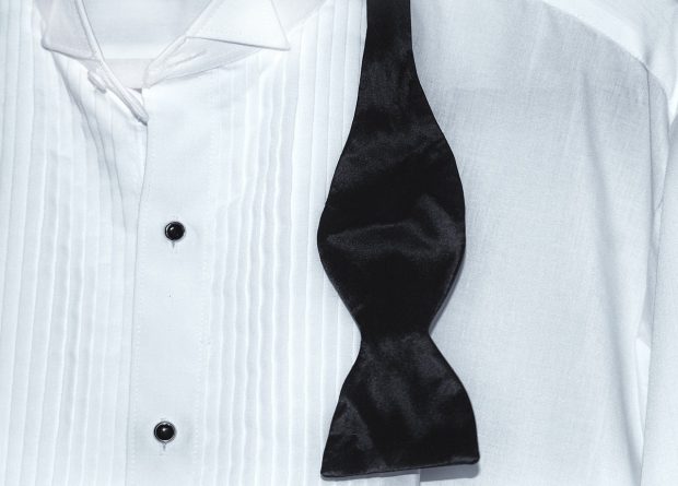 A Guide to Tuxedo Shirts And Styles: Studs on a tuxedo shirt with pleats